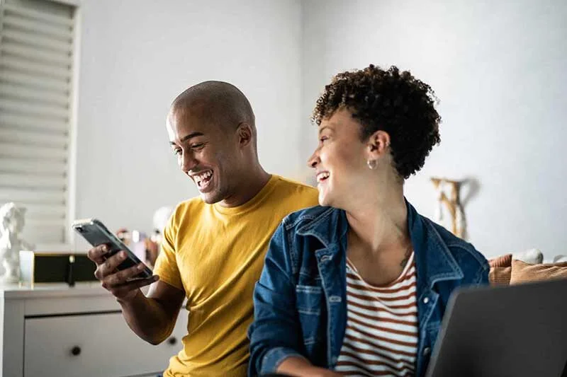couple enjoying a cannabis joint